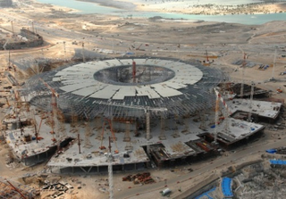 Illustration for article titled Time-Lapse Gallery Of Abu Dhabi's Nearly-Completed Ferrari World Theme Park